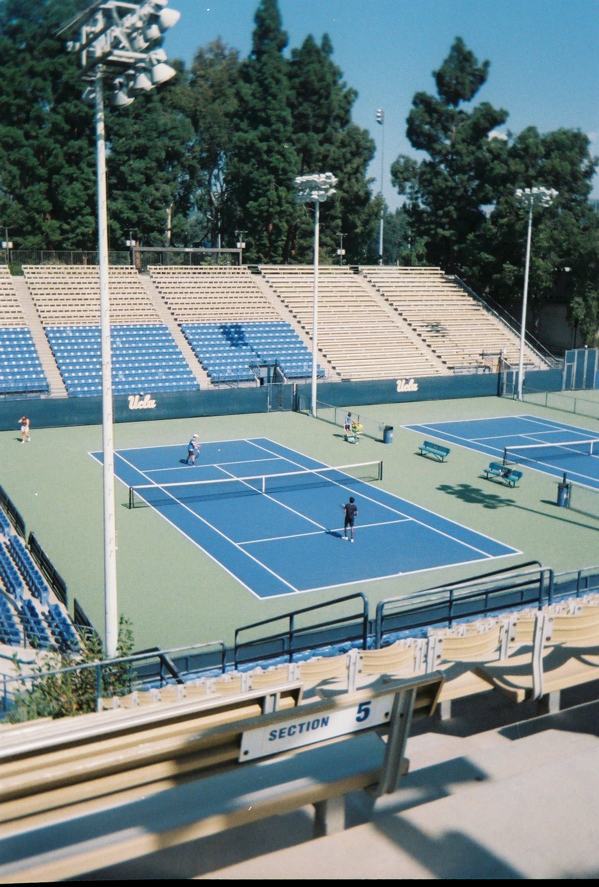 two players practice tennis