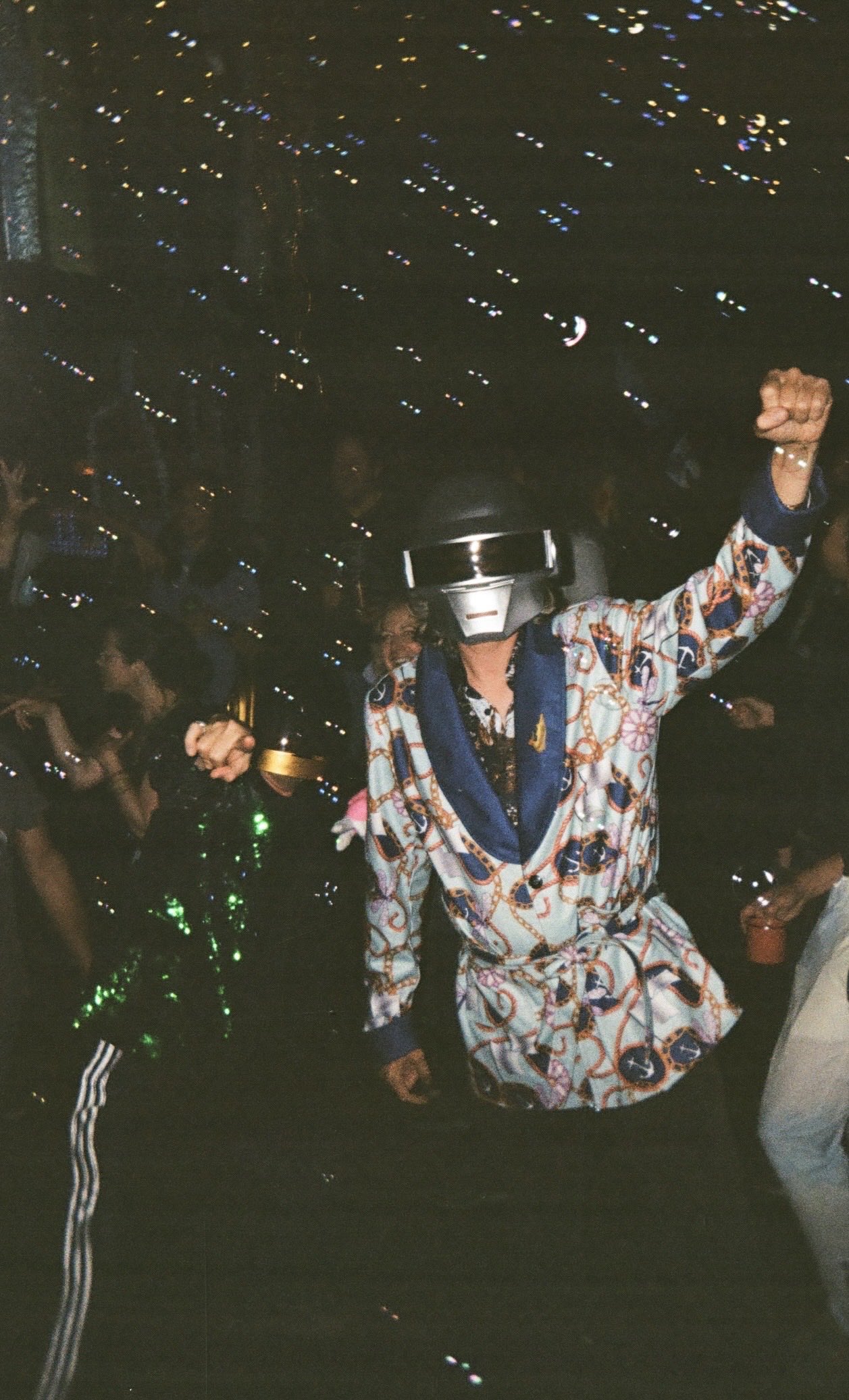 2 men dressed like daft punk